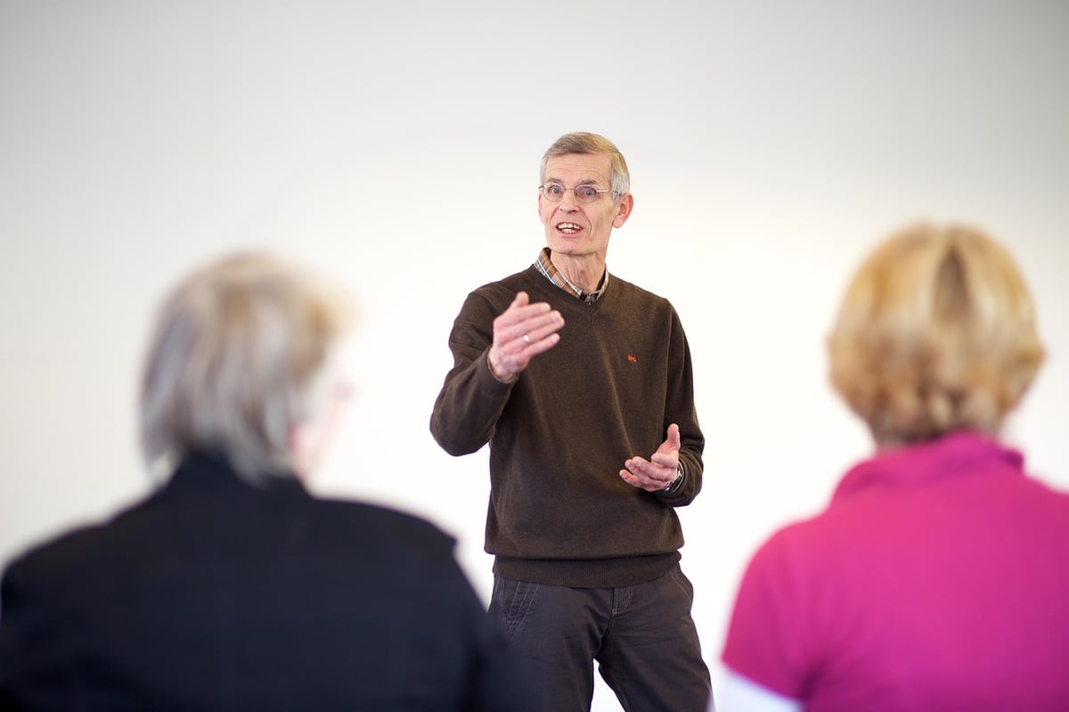 coaching dando palestra